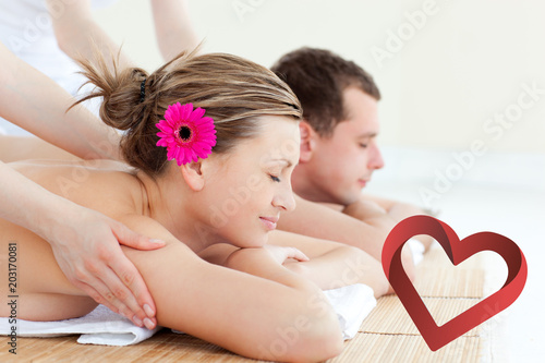 Relaxed couple having a back massage against heart