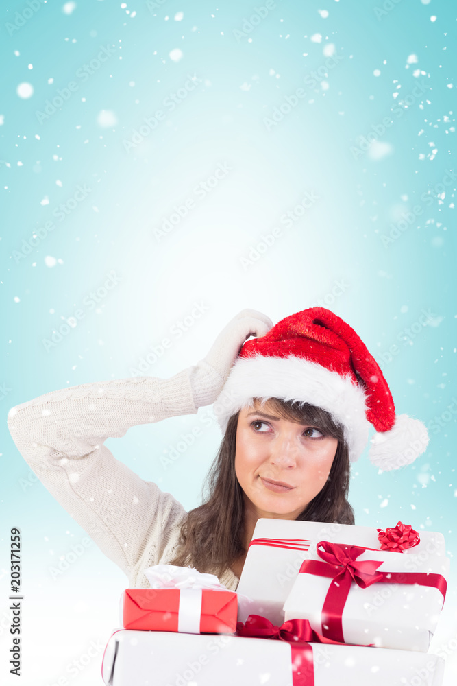 Santa woman scratching head and holding gifts against blue vignette Santa woman scratching head and holding gifts against blue vignette