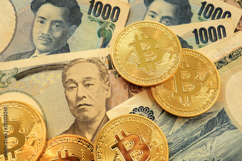 Bitcoin on Japanese Yen Bills. Concept for Cryptocurrencies in Japan