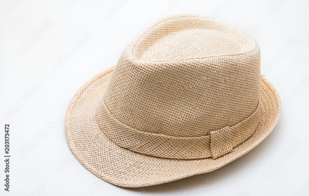 Brown straw hat on white background
