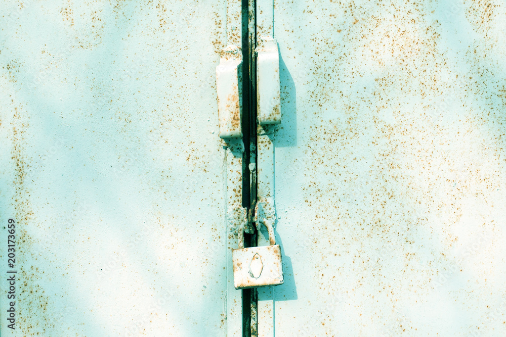 closeup metal door with lock, grungy style closeup metal door with lock, grungy style