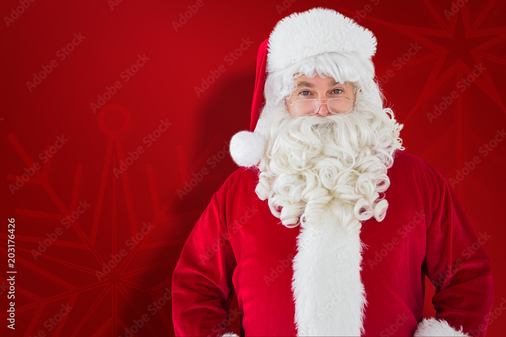 Naklejka premium Portrait of smiling santa claus against red snowflake background