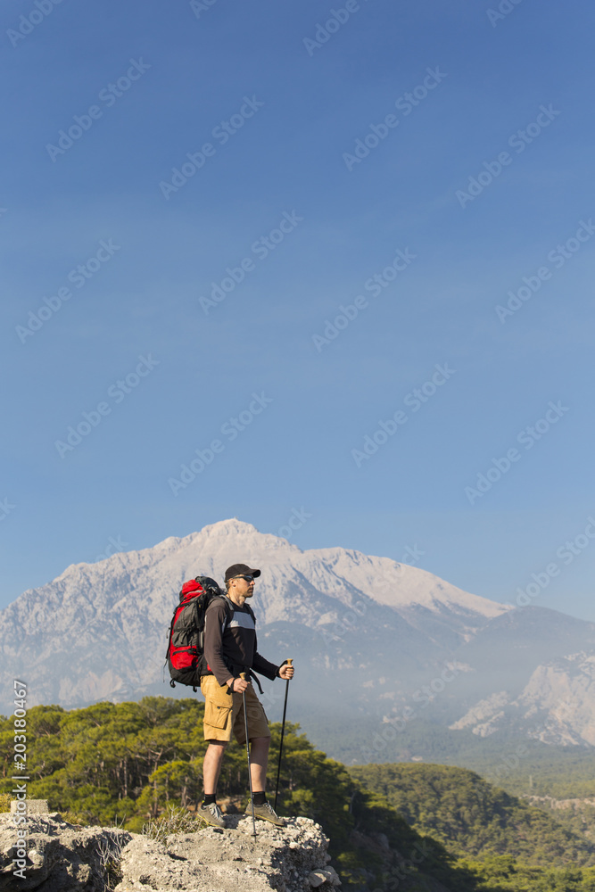Summer hike in the mountains with a backpack and tent. Summer hike in the mountains with a backpack and tent.