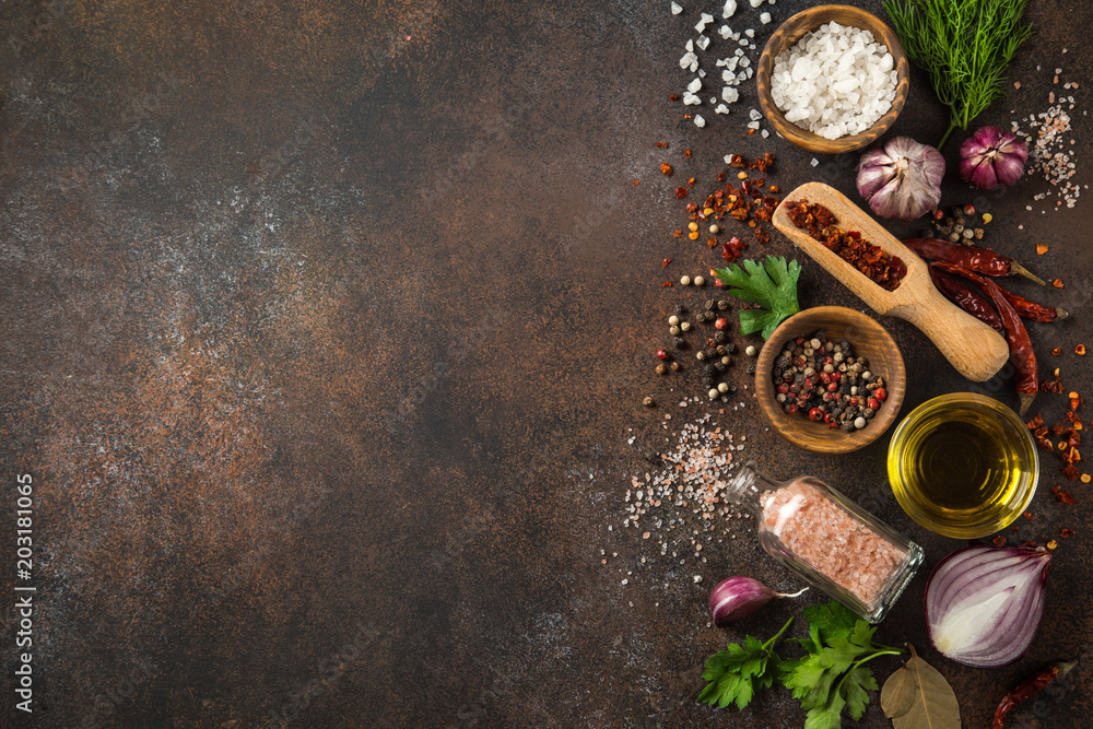 various herbs and spices on dark background.  Cooking concept. Top view. copy space - obrazy, fototapety, plakaty 