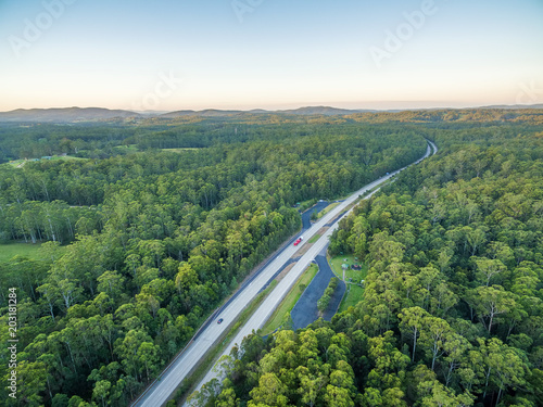 Pacific Highway winding through beautiful Australian forests at sunset
