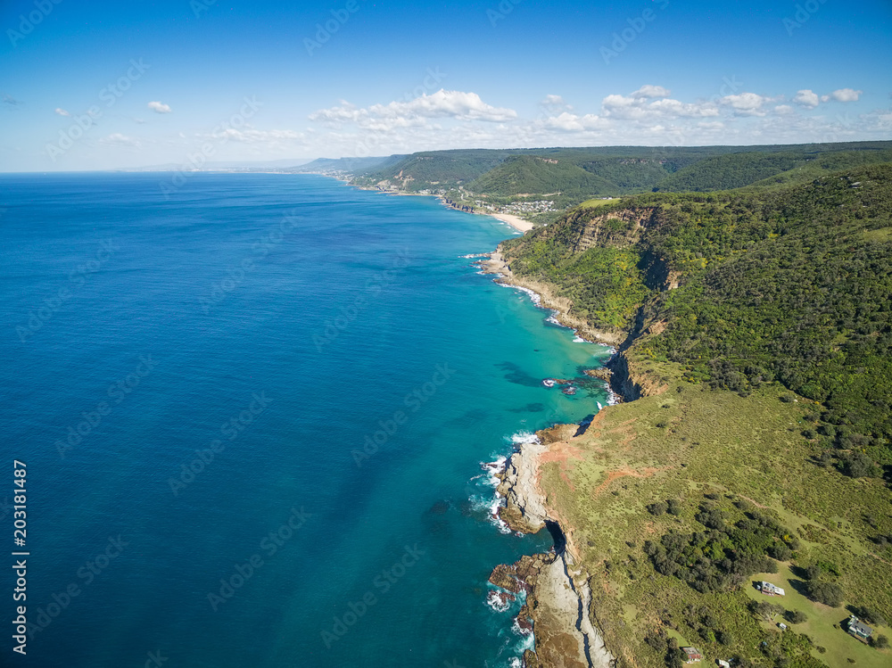 Aerial view of rugged coastline near Grand Pacific Drive, Sydney, Australia