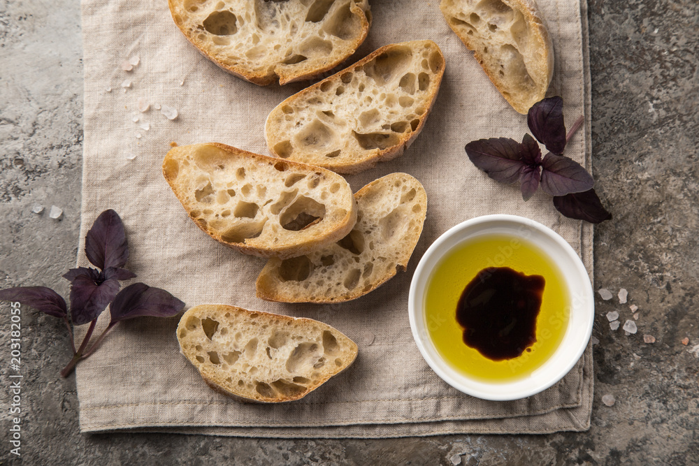 Fototapeta premium homemade italian ciabatta bread with olive oil and balsamic sauce