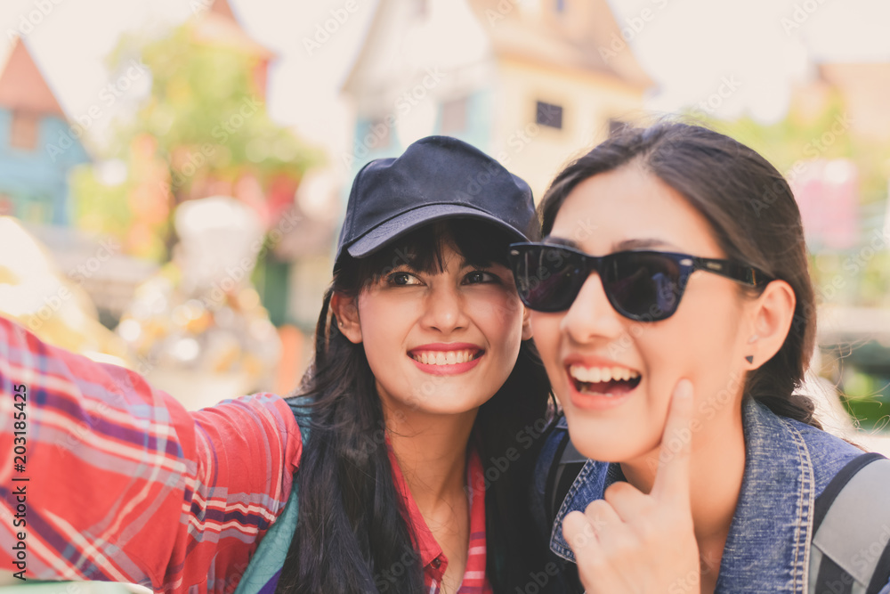 Tourists are taking photos in the city.