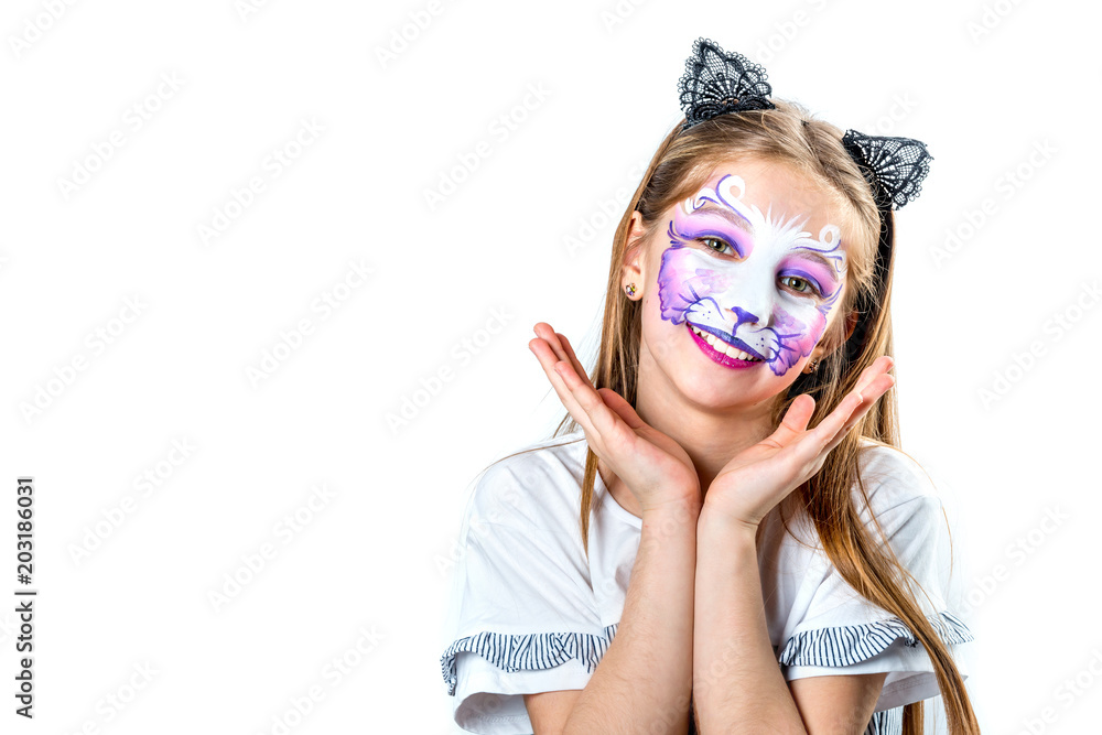 Portrait of teen girl with cat face painting