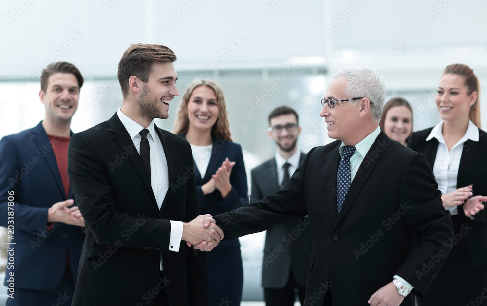 handshake of business partners after a business conference handshake of business partners after a business conference