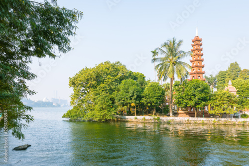 Tran Quoc pagoda the oldest buddhist temple in Hanoi in day , Vietnam photo