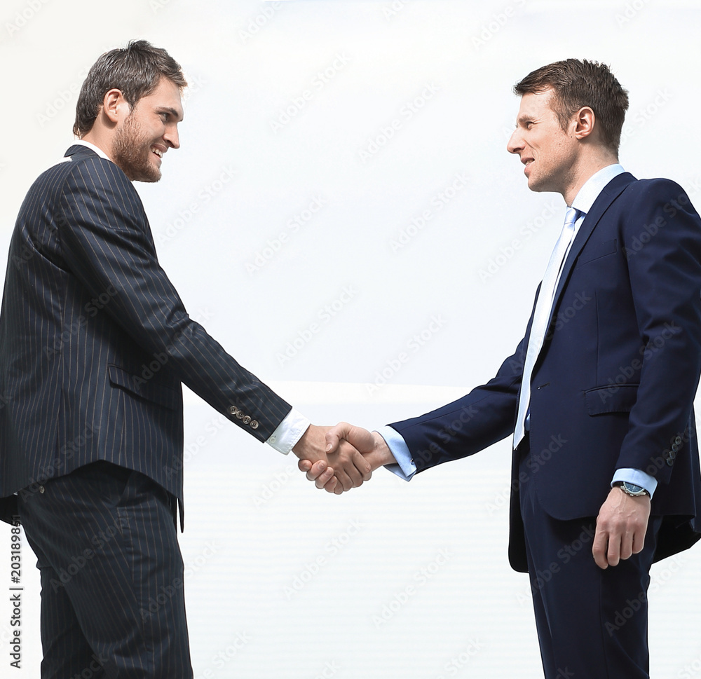 handshake business partners.isolated on a white background. handshake business partners.isolated on a white background.