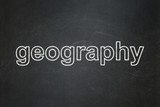Studying concept: text Geography on Black chalkboard background