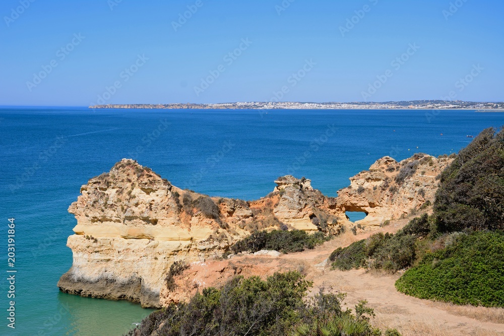 Elevated view of the rugged coastline, Praia da Rocha, Portimao, Portugal.