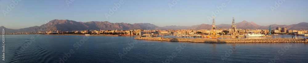 view of Palermo and the harbor at dawn from the sea
