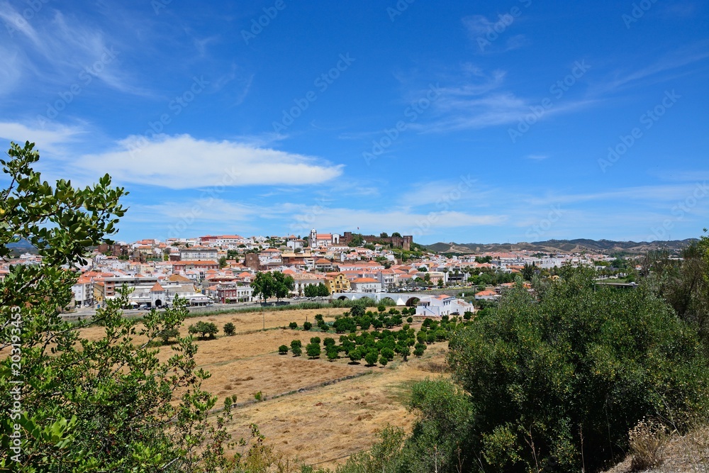 Elevated view of the white town with the castle to the right hand side, Silves, Portugal.