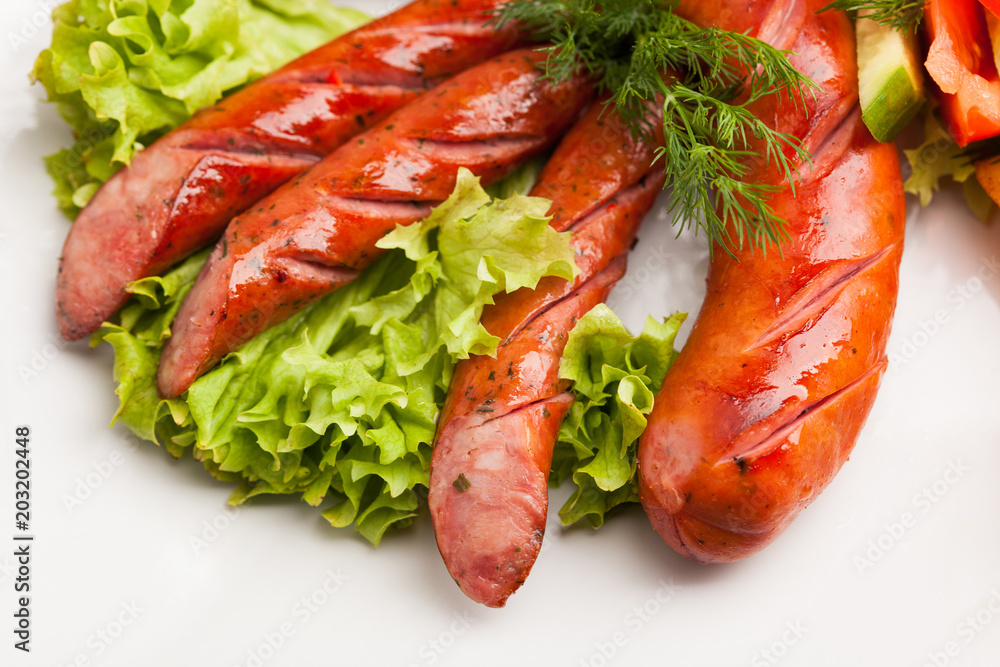 beautiful photo close-up menu of potatoes, sausage salad on a plate on a white background beautiful photo close-up menu of potatoes, sausage salad on a plate on a white background