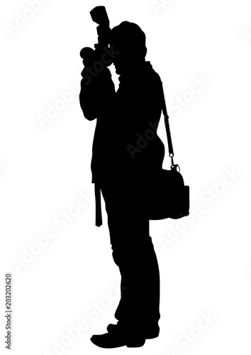 Man with a photo camera on white background