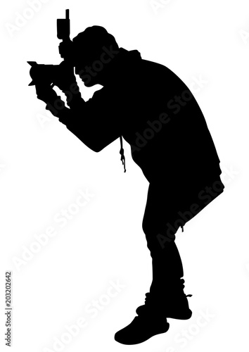 Man with a photo camera on white background