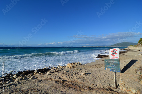 No camping sign on a beach photo