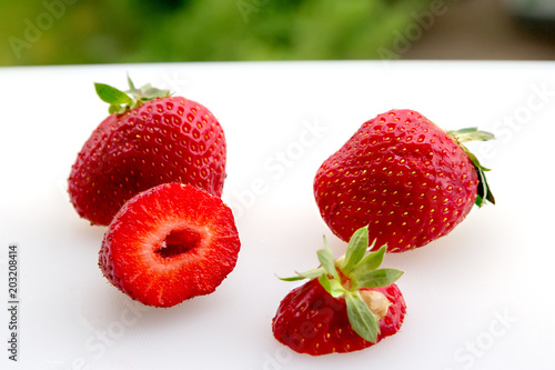 Strawberries on a white board