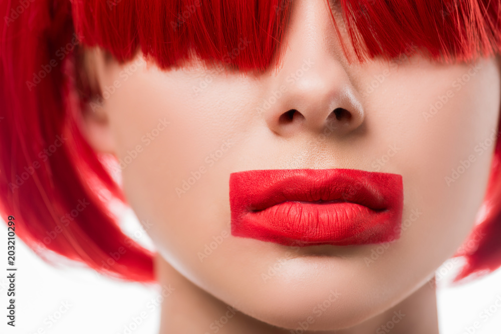 Fototapeta premium cropped image of woman with red hair and red lips in shape of rectangle isolated on white