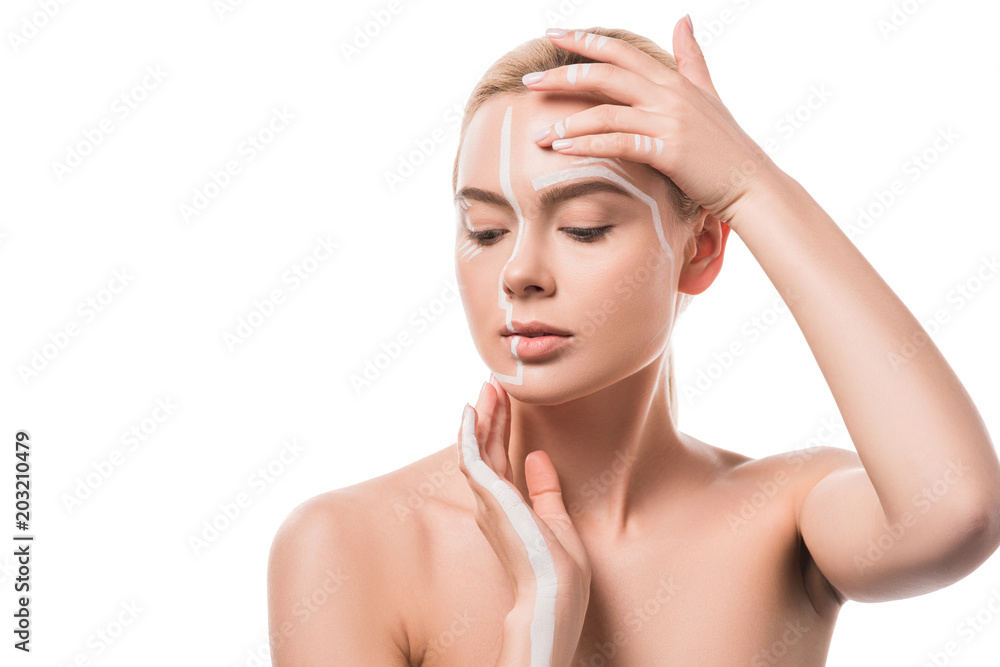 beautiful woman with white lines on face touching head with hands isolated on white Stock Photo