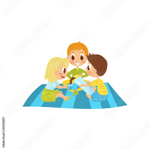 Little kids sitting on picnic carpet and drinking tea. Boy pouring hot chocolate from thermos bottle. Summer recreation. Flat vector design