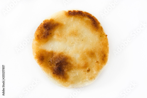 Arepa isolated on white background. Venezuelan typical food. Top view
