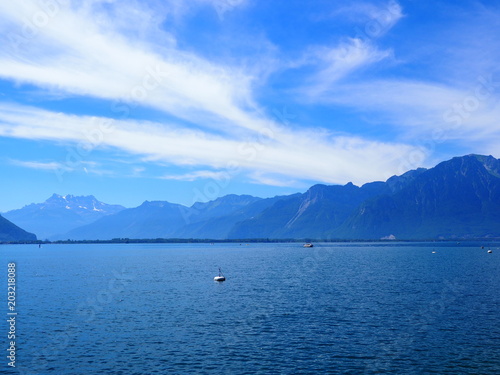 View of alpine Lake Geneva with buoyes landscape seen from promenade in european Montreux city in Switzerland