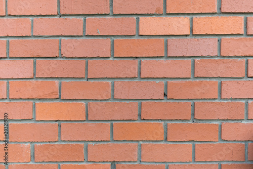 Weathered stained brick wall background