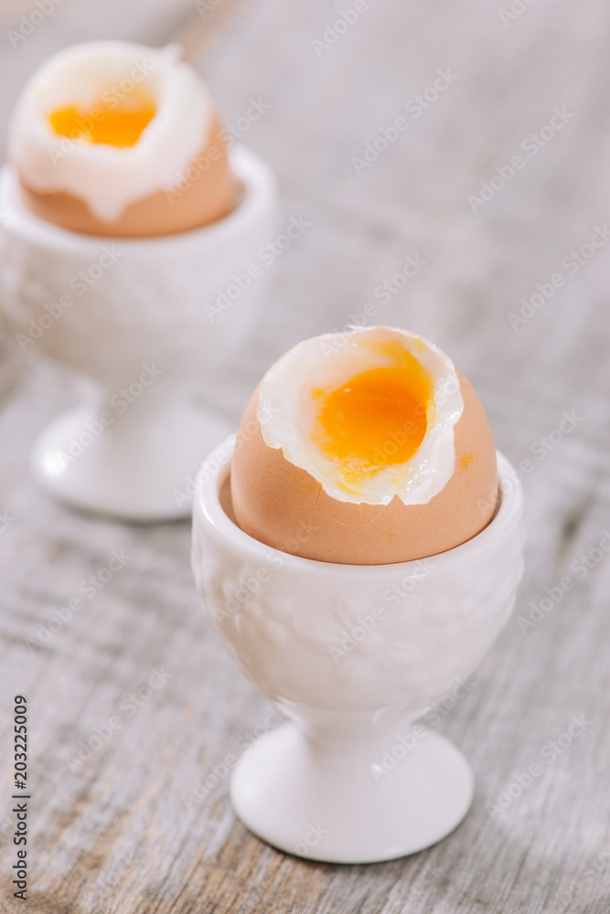 delicious breakfast with boiled eggs and crispy toasts, horizontal, closeup delicious breakfast with boiled eggs and crispy toasts, horizontal, closeup