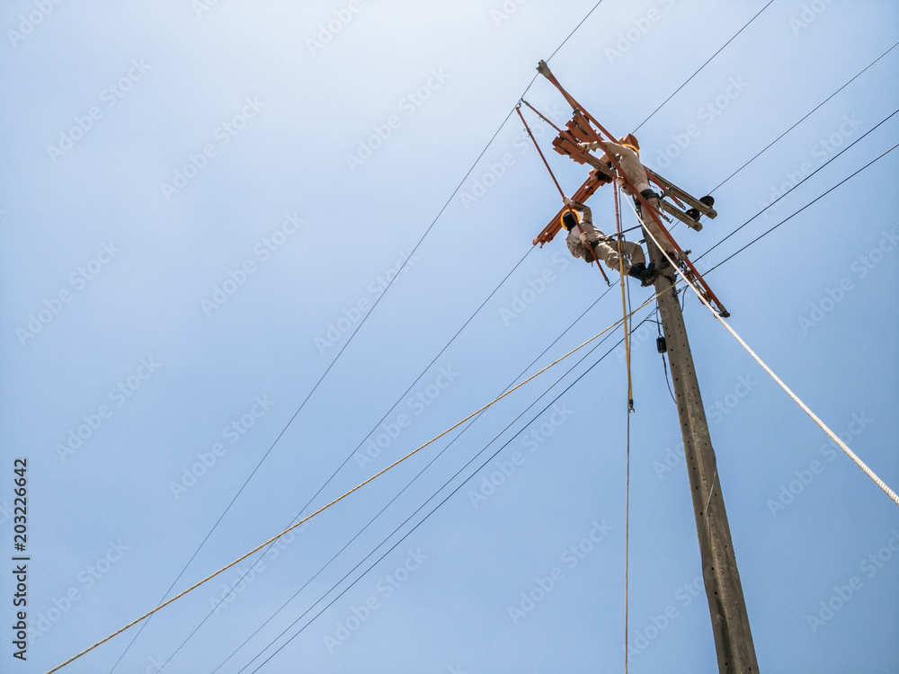 Fototapeta premium Lineman maintenance high voltage distribution system 04