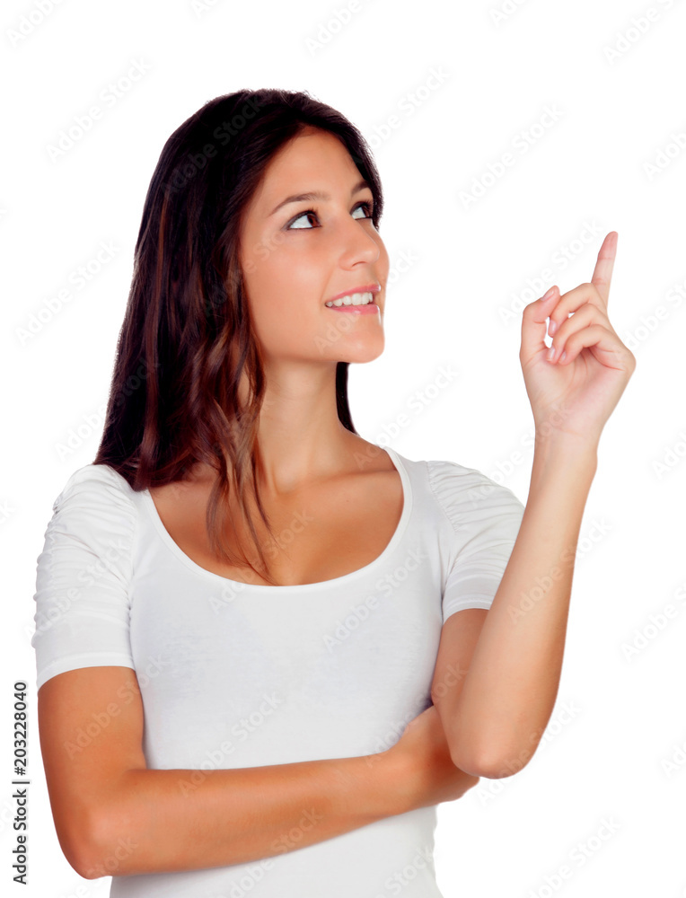 Pretty woman smiling and indicating something with her finger Pretty woman smiling and indicating something with her finger