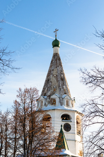 bell tower with clock in Suzdal Kremlin in winte photo