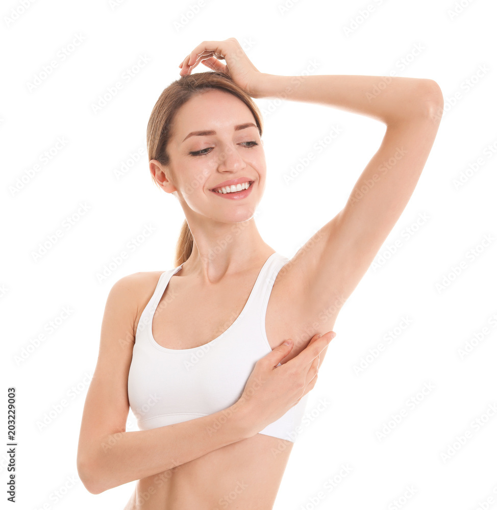 Young woman showing smooth silky skin after epilation on white background