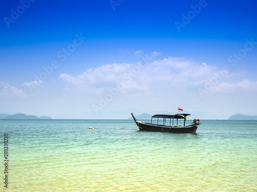 boat in the sea with the blue sky 