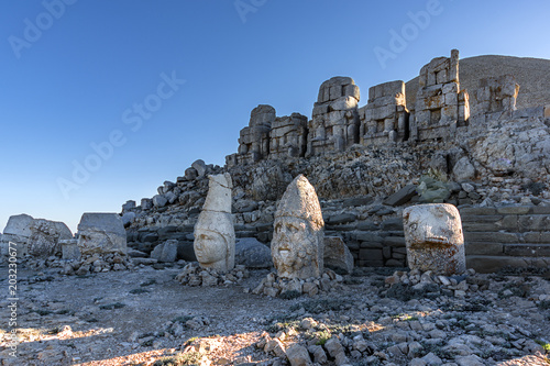 The tomb, which was commissioned by Antiochos I, King of Commagene, who reigned on the slopes of Mount Nemrut, to show his gratitude to the gods and their ancestors, photo