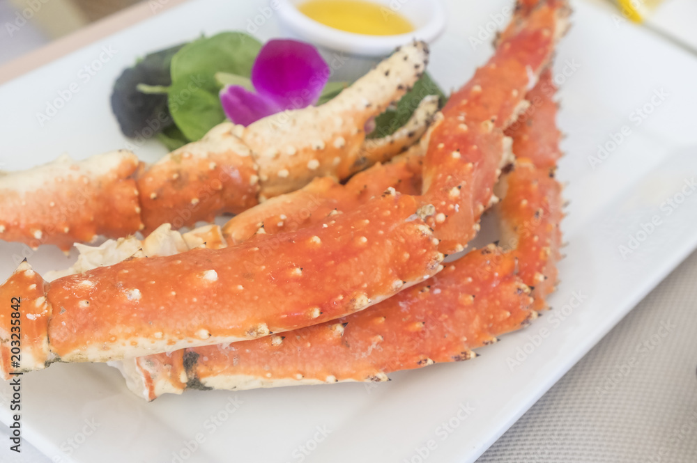 Prepared Alaskan King Crab Legs Served in a Restaurant Prepared Alaskan King Crab Legs Served in a Restaurant