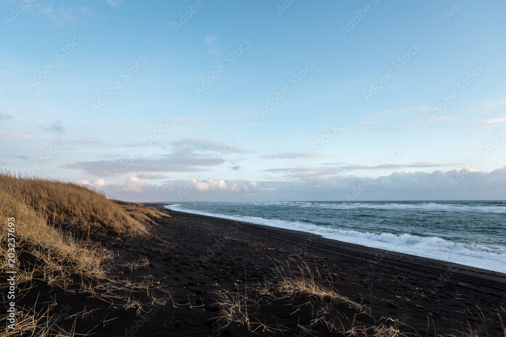 Iceland, Black sand beach with wave, sunset