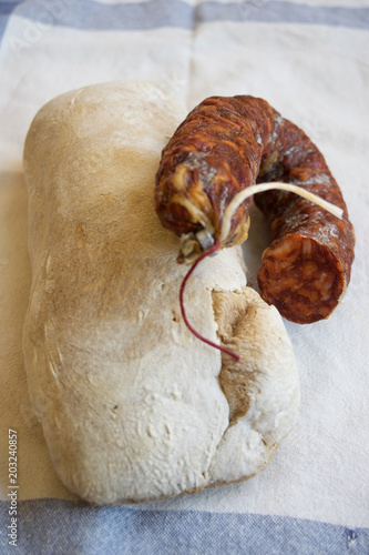 long loaf bread and chorizo sausage photo