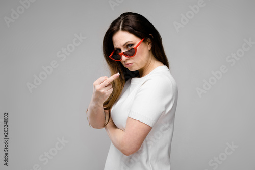 Attractive overweight woman in sunglasses