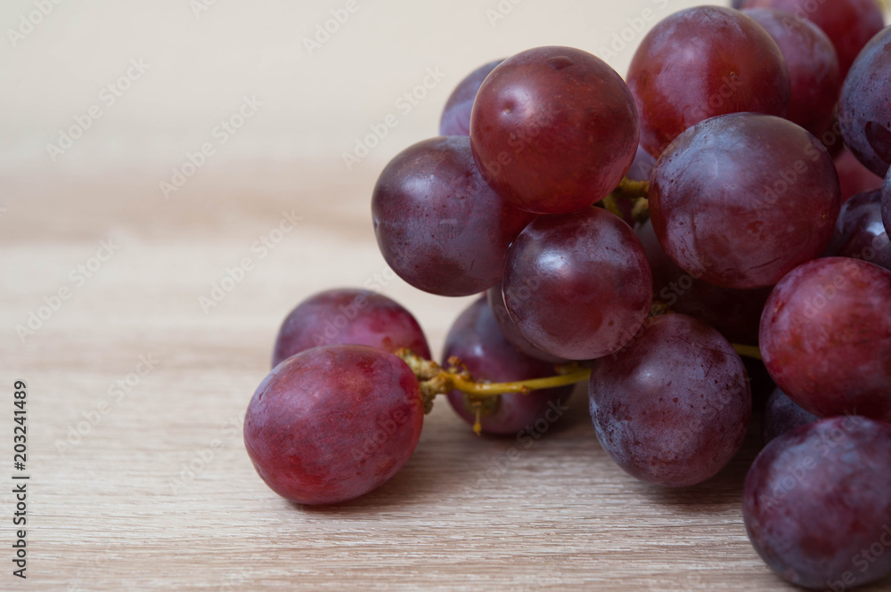 Fresh grape on wooden table,fresh grape,delicious grape Fresh grape on wooden table,fresh grape,delicious grape