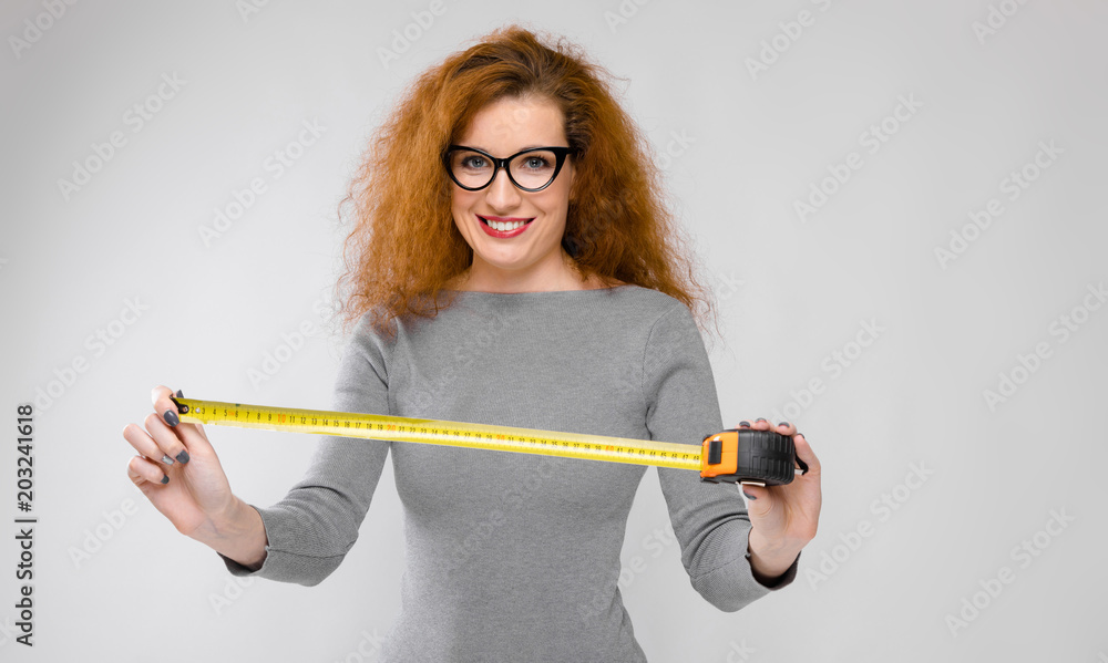 Attractive woman with ruler Attractive woman with ruler