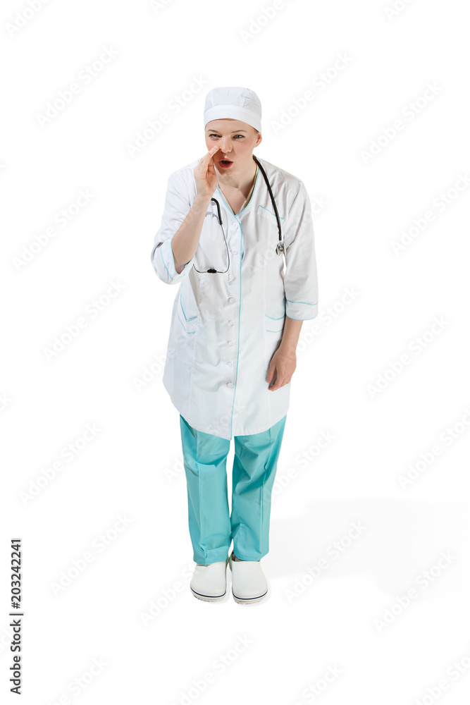 Beautiful young woman in white coat posing at studio. Full length studio shot isolated on white. Beautiful young woman in white coat posing at studio. Full length studio shot isolated on white.