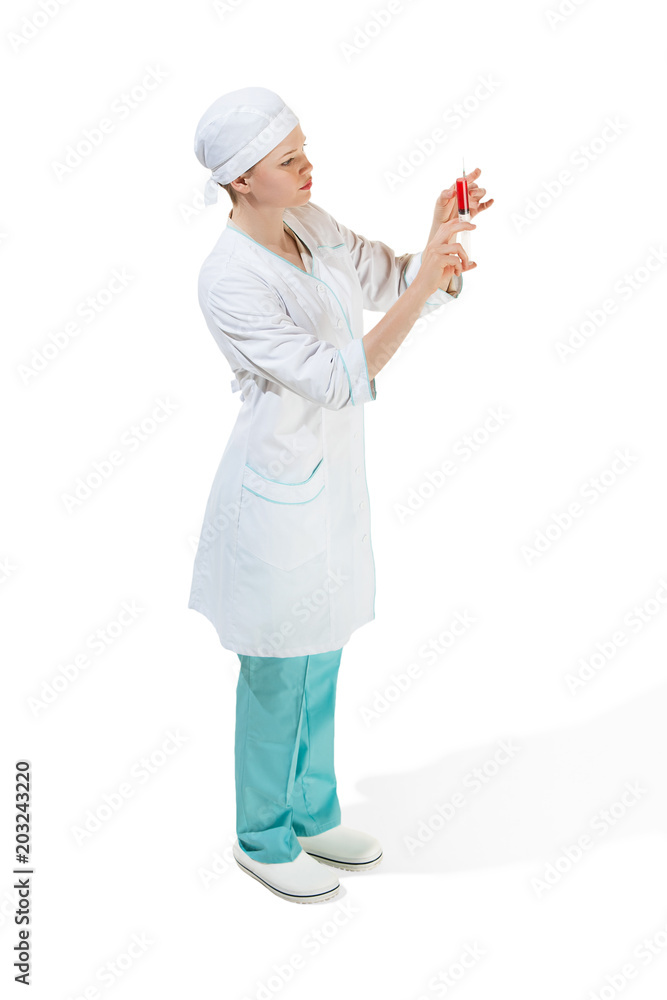beautiful young woman doctor in medical robe holding syringe in hand. beautiful young woman doctor in medical robe holding syringe in hand.
