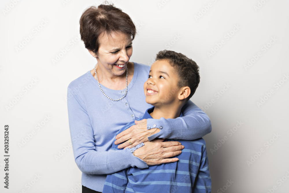black Boy with grandmother in studio white background black Boy with grandmother in studio white background