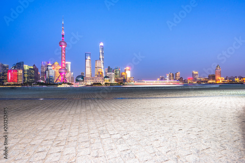 city skyline with empty marble floor