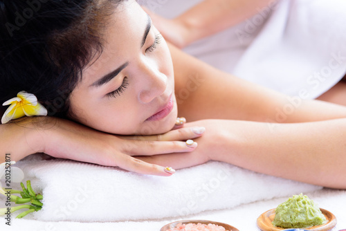 Portrait of beautiful asian people with close up view and close up eyes and having hand massage in spa salon. Beauty  healthy  spa and relaxation concept.