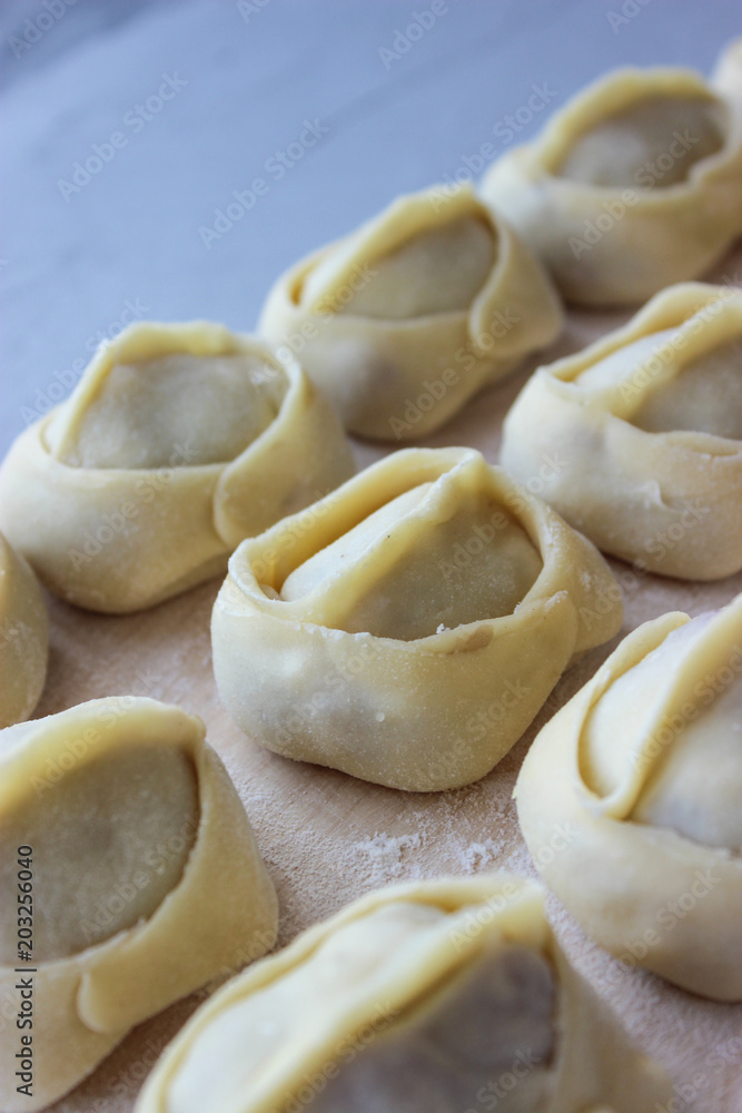 Dumplings of thin dough stuffed Dumplings of thin dough stuffed